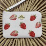 Muñequeras Coach